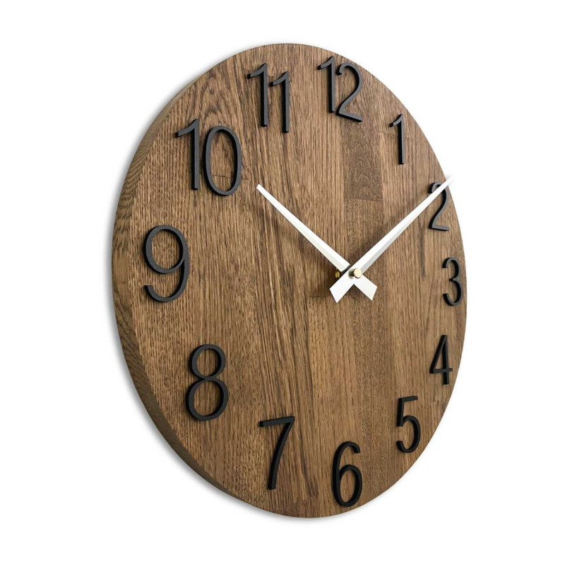 Natural wooden clock with a simple design and thin hands.