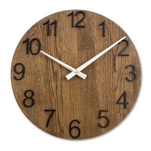 A shot of a clock face made of wood with a clean and simple look.