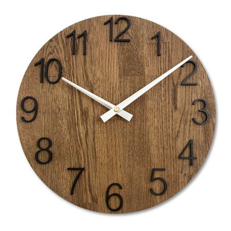 A shot of a clock face made of wood with a clean and simple look.