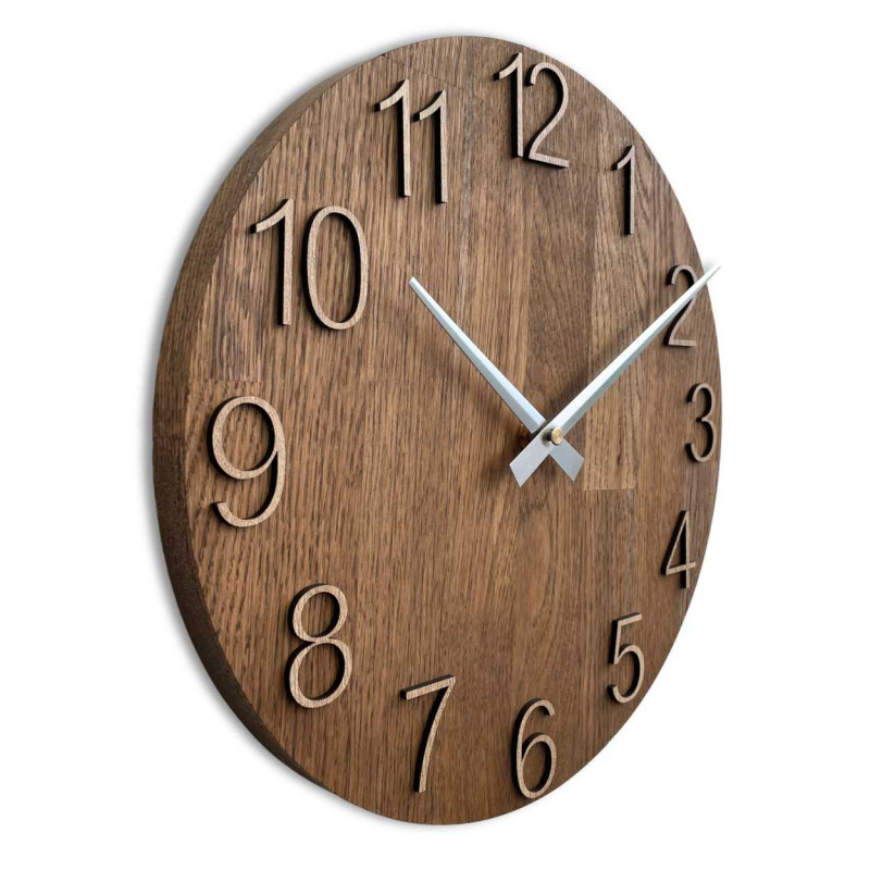 Round clock made of natural wood with contrasting metal hands.