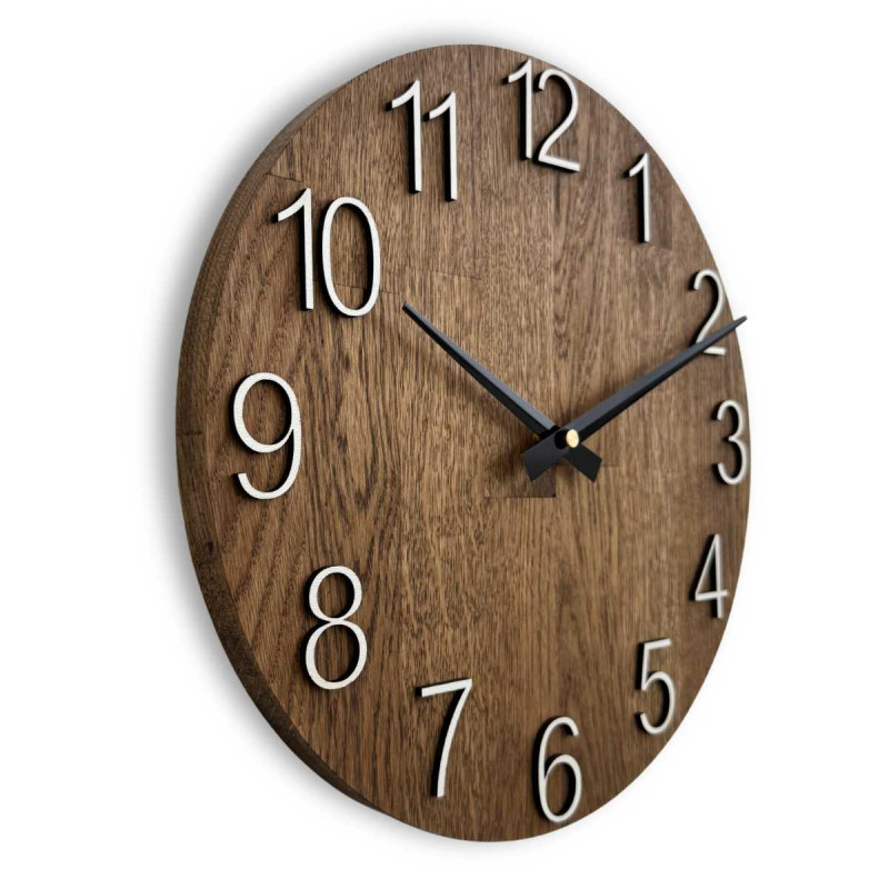 A shot of a clock face made of wood with a clean and simple look.