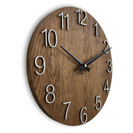 A shot of a clock face made of wood with a clean and simple look.