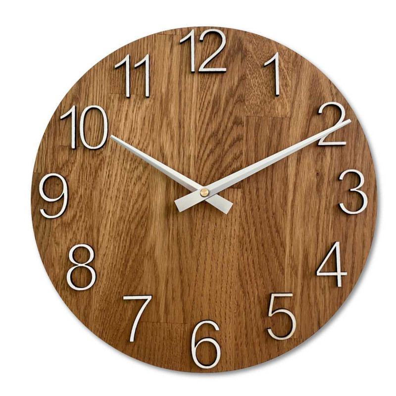 Clock made of solid wood with engraved numbers and a natural pattern.