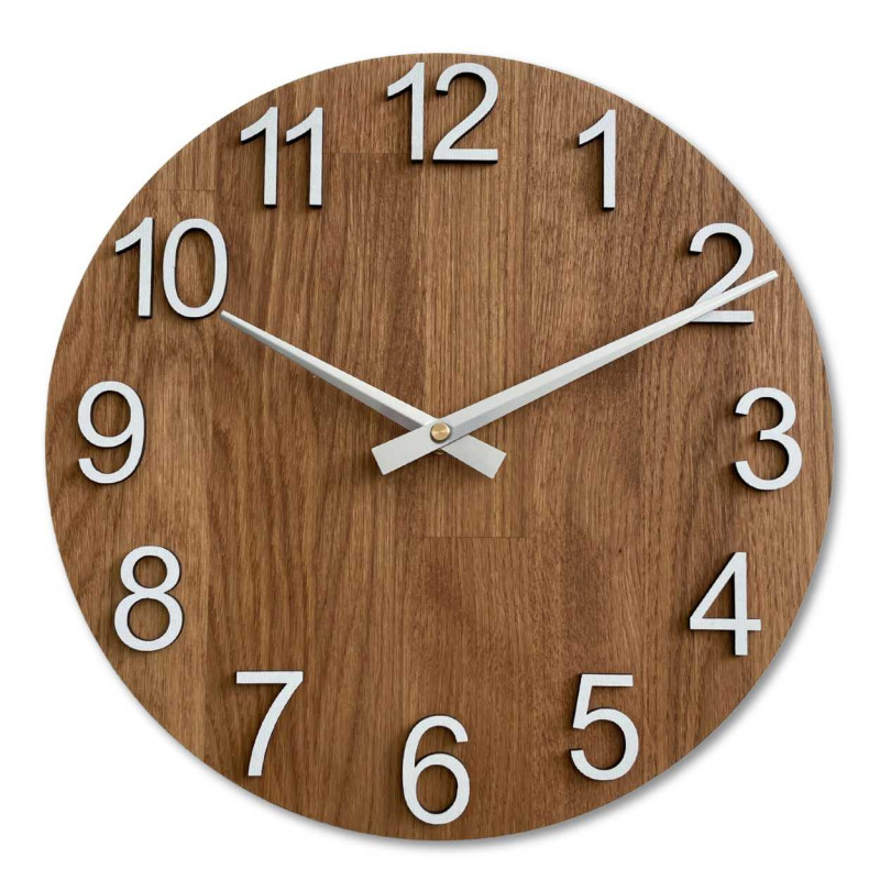 Wooden wall clock with a circular shape and a subtle natural motif.