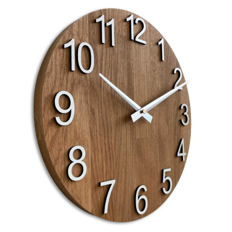 Round clock made of natural wood with contrasting metal hands.