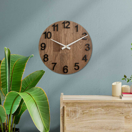 Simple wall clock with wooden base without numbers