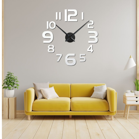 Modern wall clock with black 3D numbers and metal central mechanism Modern wall clock with black 3D numbers and metal central mechanism