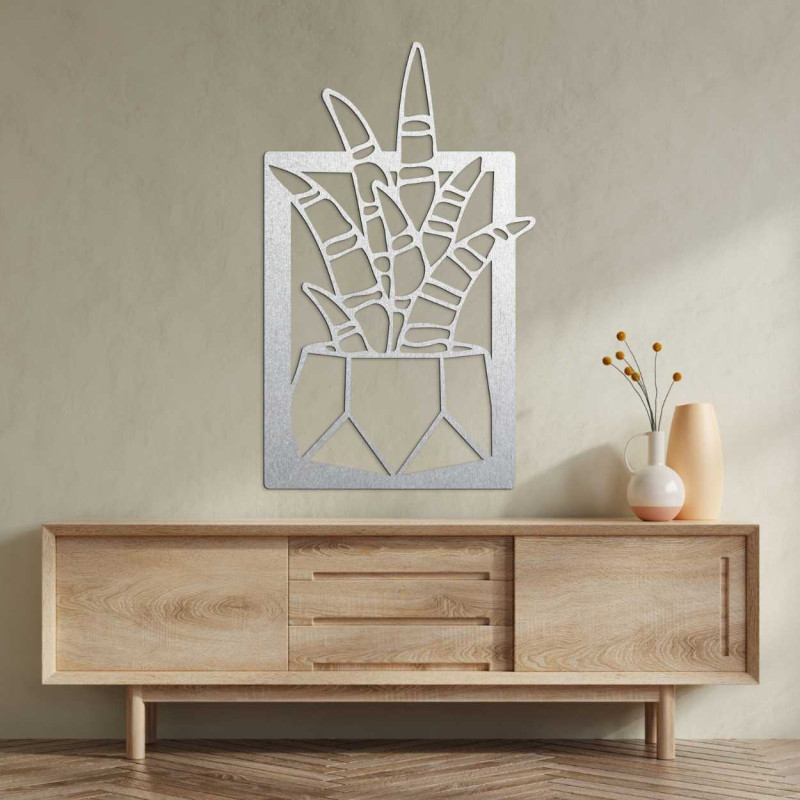 Modern wall clock with wooden surface and metal hands.