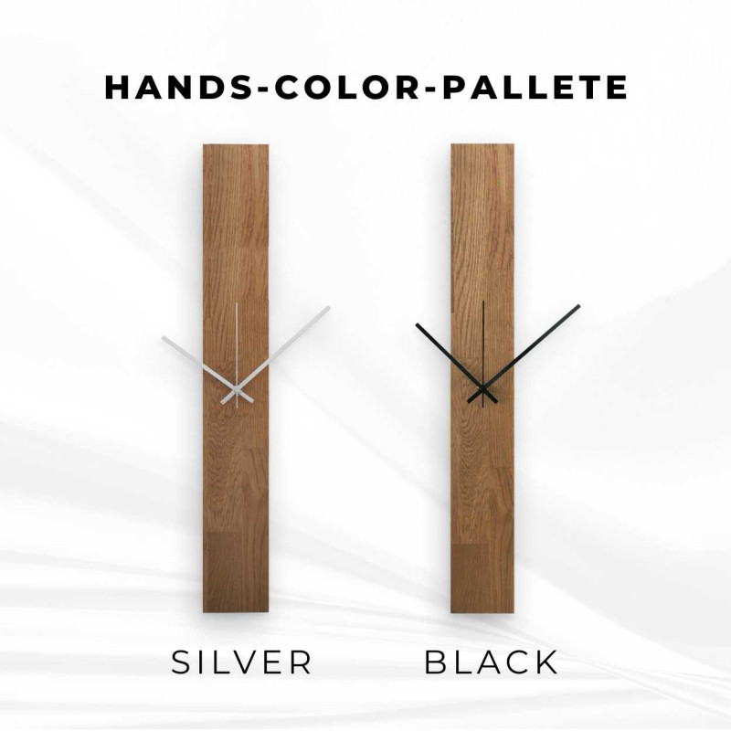 Narrow tall wooden wall clock in a rectangular shape with black hands