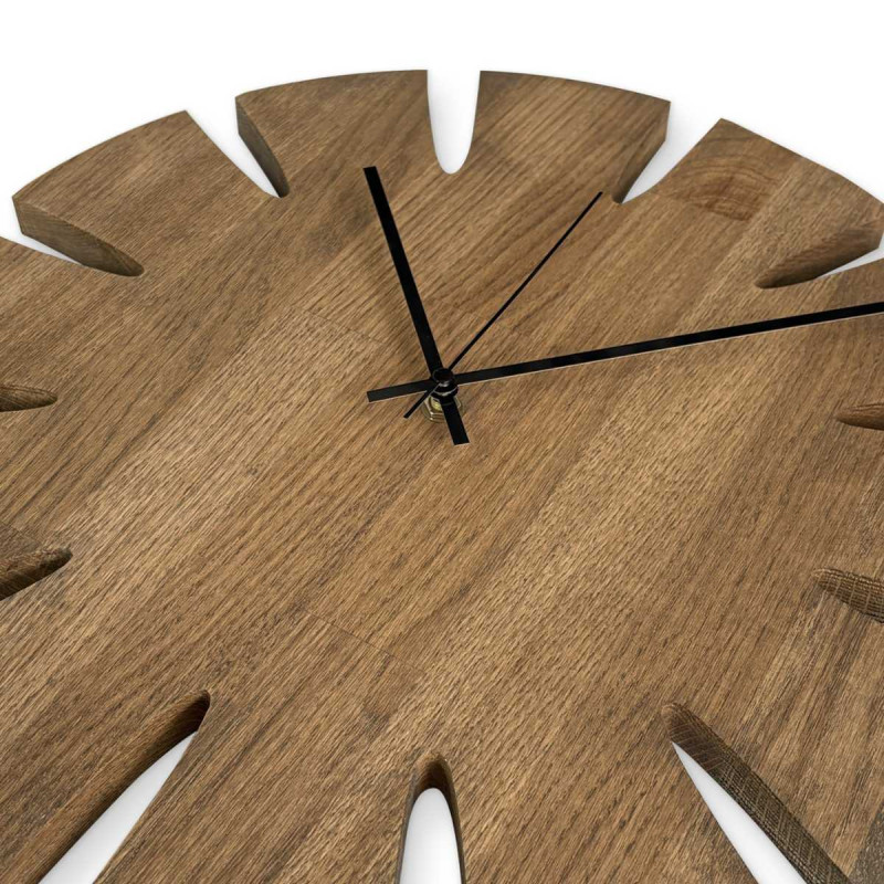 Elegant large wooden wall clock with a simple dial designed for the kitchen.