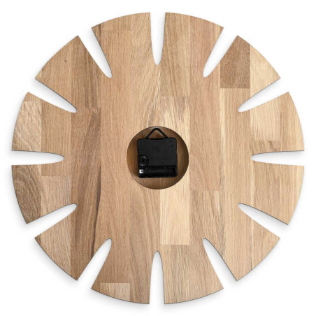 High-quality clock made of wood with an original artistic motif.