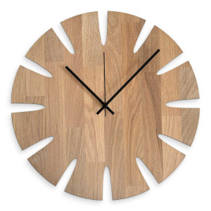 Designer wooden clock with a stylish motif for a modern interior.