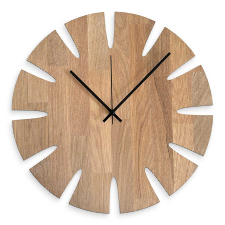 Designer wooden clock with a stylish motif for a modern interior.