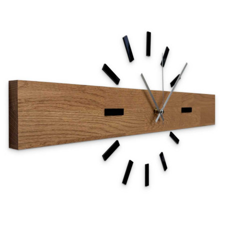Simple and inexpensive wooden clock as a universal wall decoration.