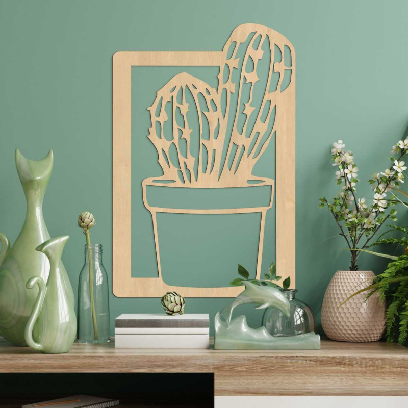 Large wooden wall painting with a carved motif of a cactus in a flower pot.