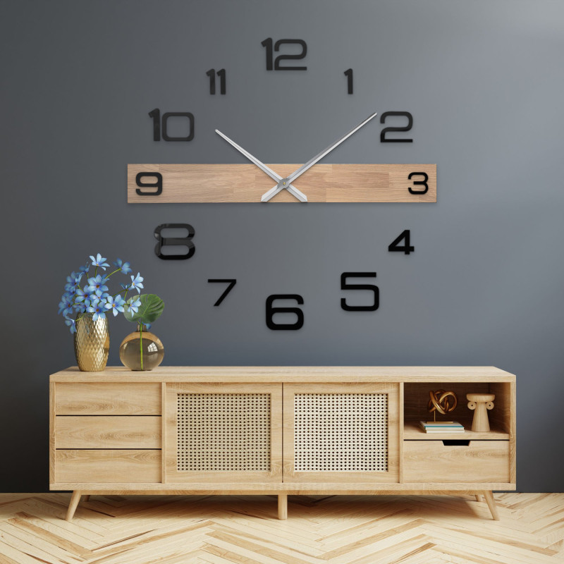 Stylish wooden clock for the living room with distinctive numbers and elegant hands.