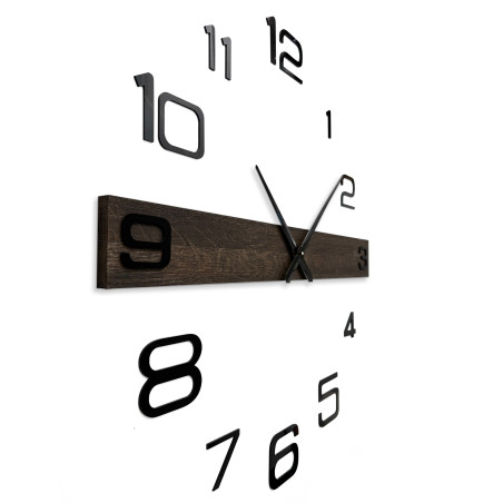 Modern wooden wall clock with large black numbers and elegant hands.
