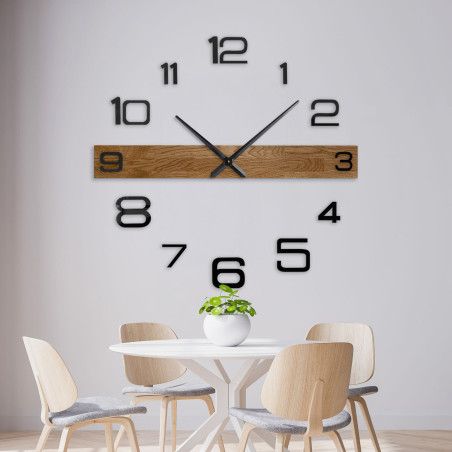 Elegant and modern clock with a wooden center section and black hour markers.