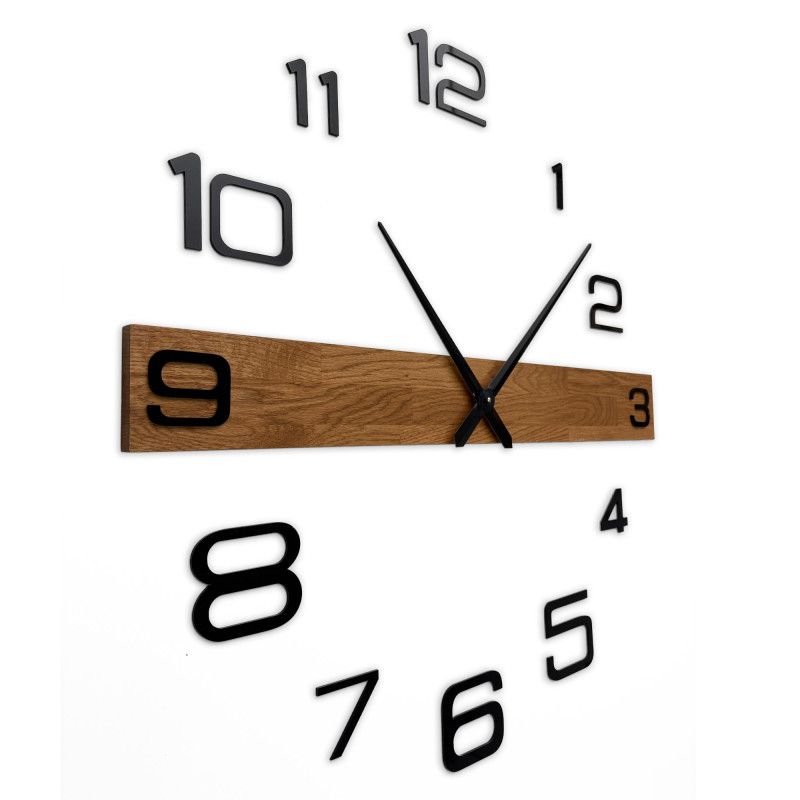 Wooden wall clock with distinctive black numbers and black hands.