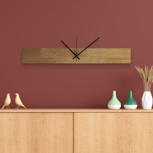 Modern and inexpensive wooden clock with dark hands and black separate digits. 2