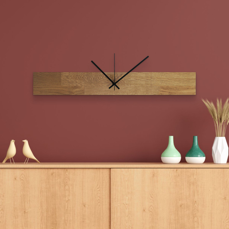 Modern wall clock with a wooden center bar and black, separate digits.