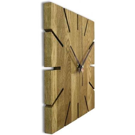 Wooden wall clock made of oak wood Wooden wall clock made of oak wood