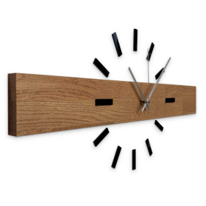 Simple and inexpensive wooden clock as a universal wall decoration.