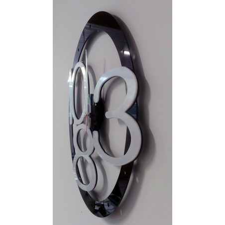 Modern wall clock made of plastic. Own production, X-momo Modern wall clock made of plastic. Own production, X-momo