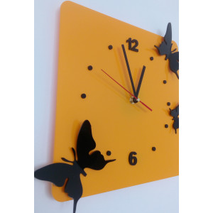 Modern wall clock made of plexiglass. Trendy clock on the wall as a gift. X-momo clocks. PMMA 2