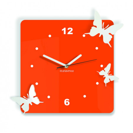 Modern wall clock made of plexiglass. Trendy clock on the wall as a gift. X-momo clocks. PMMA Modern wall clock made of plexiglass. Trendy clock on the wall as a gift. X-momo clocks. PMMA
