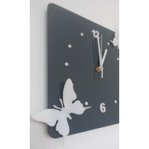 Modern wall clock made of plexiglass. Trendy clock on the wall as a gift. X-momo clocks. PMMA 2