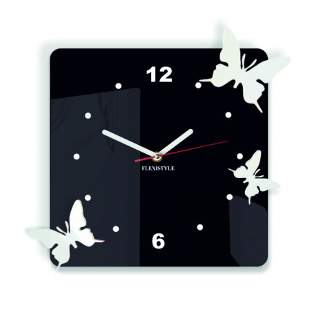 Modern wall clock made of plexiglass. Trendy wall clock as a gift. X-momo clock. PMMA Modern wall clock made of plexiglass. Trendy wall clock as a gift. X-momo clock. PMMA