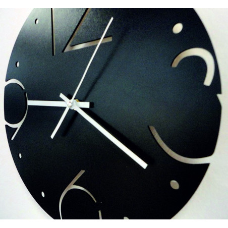 Silent clock with a stylish dial and contrasting hands on an oak board. Silent clock with a stylish dial and contrasting hands on an oak board.