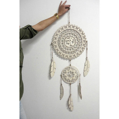 Elegant wooden dream catcher made of poplar plywood, handmade, decoration for a cozy room. Elegant wooden dream catcher made of poplar plywood, handmade, decoration for a cozy room.
