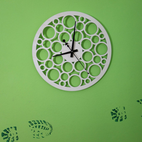 Wall clock made of wood plywood in the footsteps of time Wall clock made of wood plywood in the footsteps of time