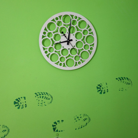 Wall clock made of wood plywood in the footsteps of time Wall clock made of wood plywood in the footsteps of time