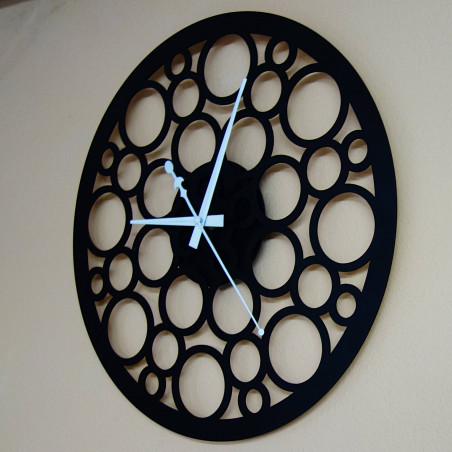 Wall clock made of wood plywood in the footsteps of time Wall clock made of wood plywood in the footsteps of time
