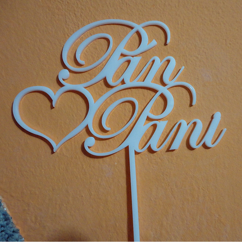 Plastic groove adornment on cake gentleman and mistress. Dimensions 150 x 222 mm